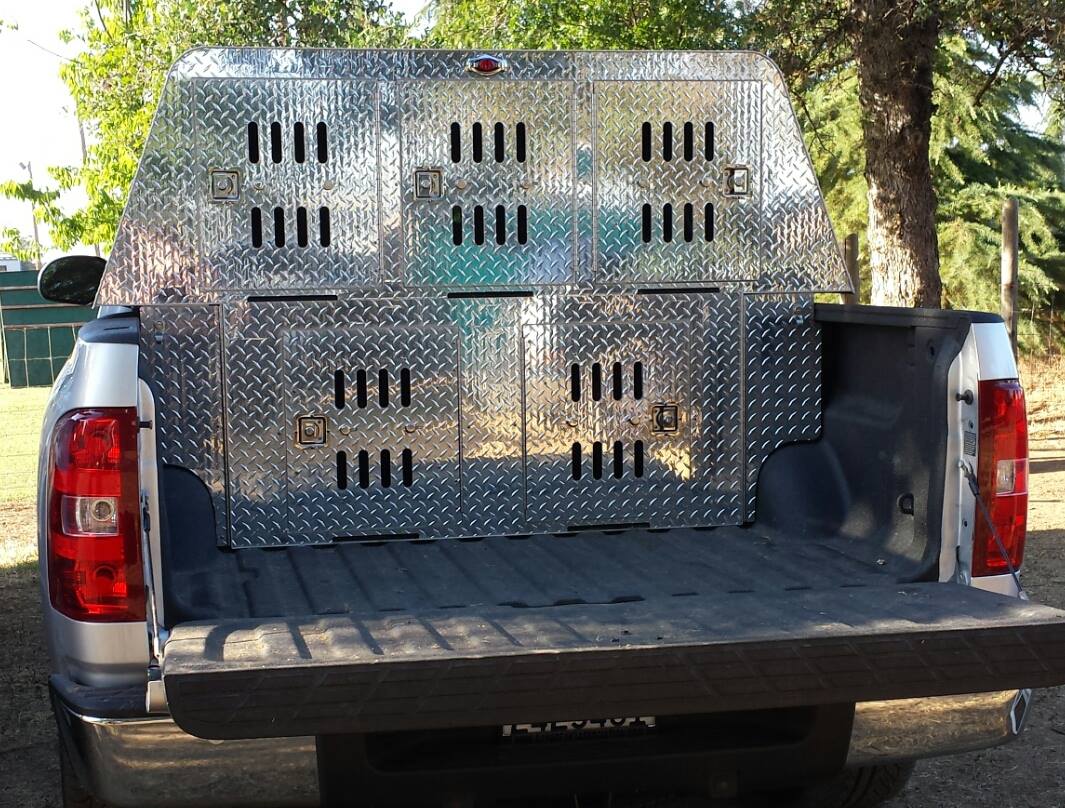 Our crates are made with high grade aluminum, sturdy hinges and unbreakable locks. So if your looking for a custom dog crate, Rogue Custom Crates has you covered.